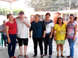 Dale Lyster, Ana Cruz Soliz with the mothers who did the cooking.