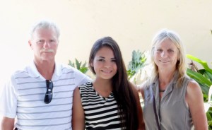 Dick & Kris McGure with university scholarship winner Kathia. Kathia is studying to be a chef.
